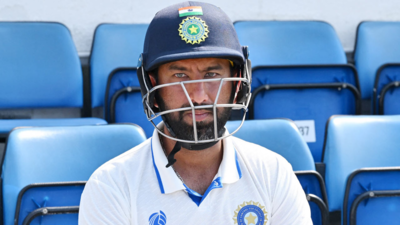 Cheteshwar Pujara visits India's training session.