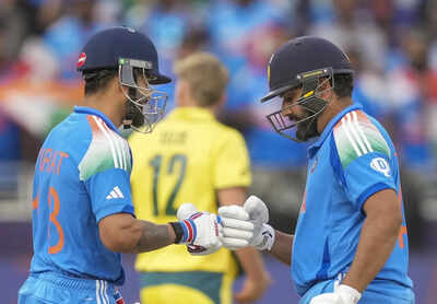 Rohit Sharma and Virat Kohli during a match in Dubai.