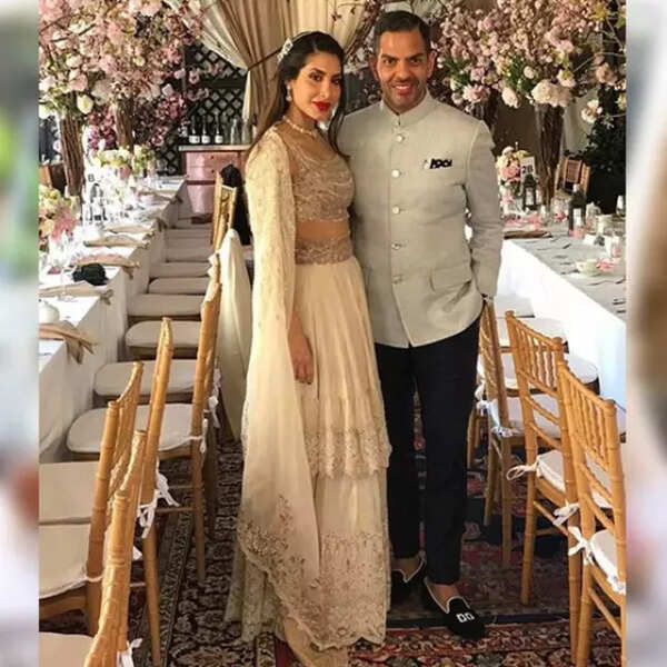 Days after his untimely demise, Sunjay Kapur's reception photos with Priya Sachdev goes viral; Looked dashing in hand embroidered shoes, written 'I do'